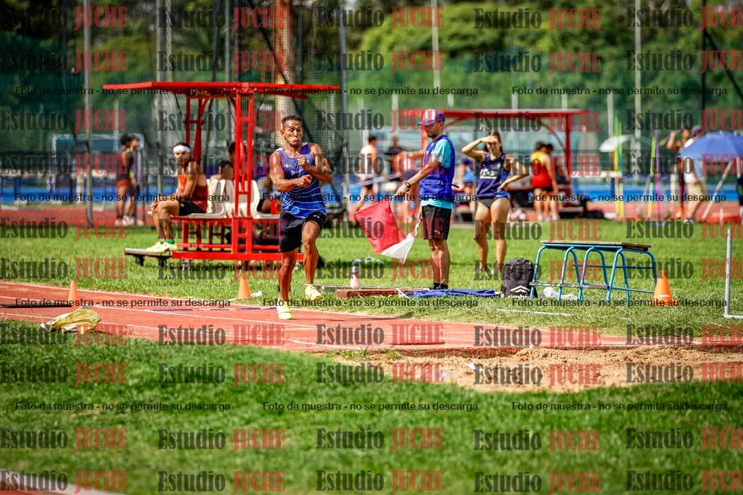 Fotos del salto triple de mujeres y varones