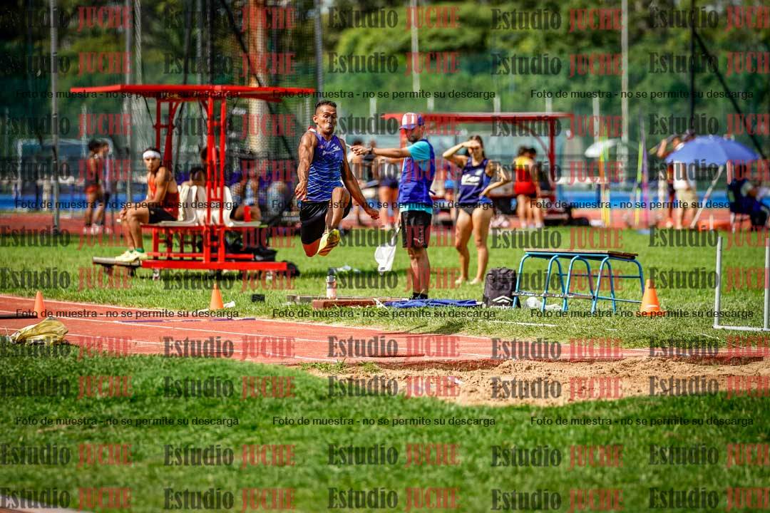 Fotos del salto triple de mujeres y varones