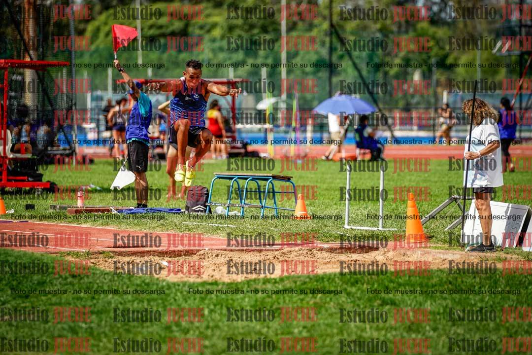 Fotos del salto triple de mujeres y varones