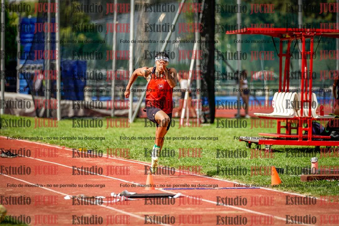Fotos del salto triple de mujeres y varones