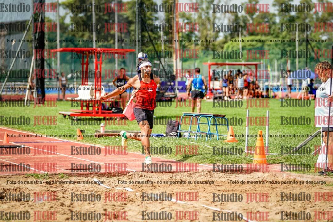 Fotos del salto triple de mujeres y varones
