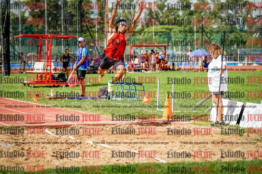 Fotos del salto triple de mujeres y varones