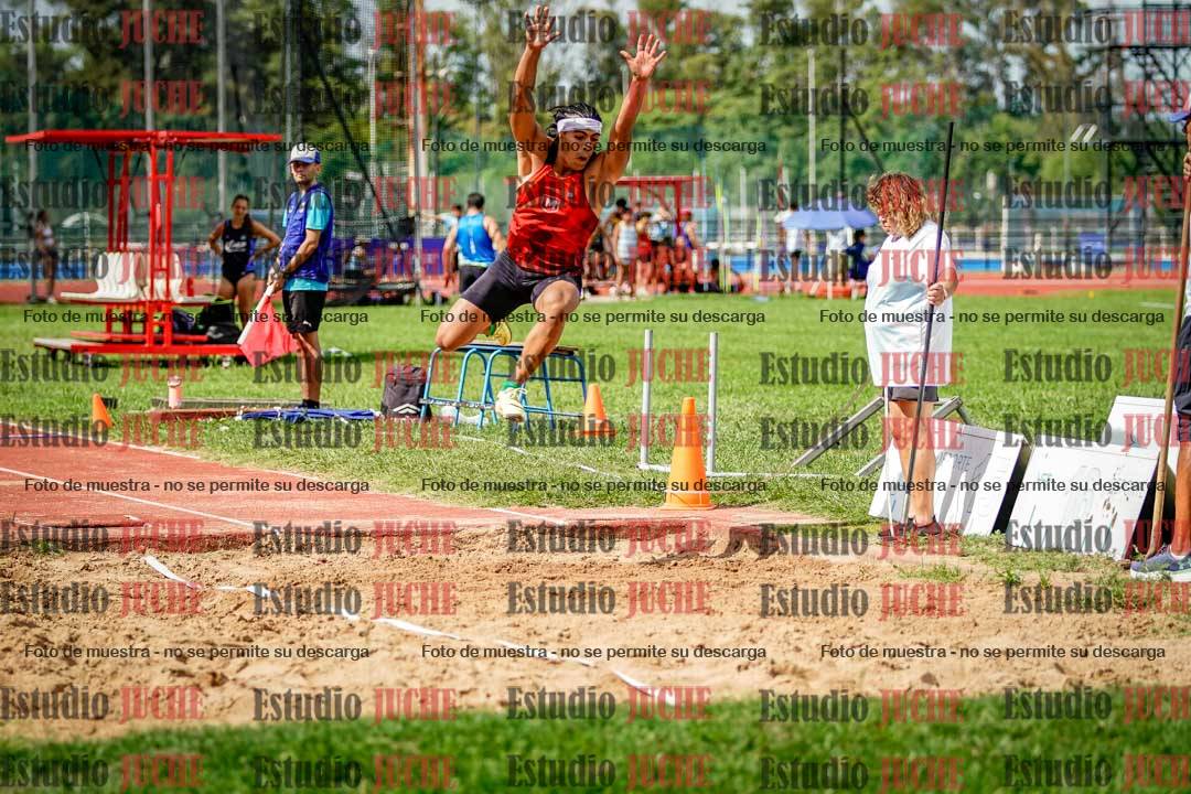 Fotos del salto triple de mujeres y varones