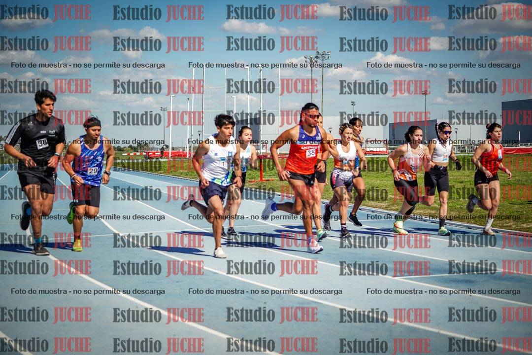 Fotos de los 5000 m llanos de mujeres y varones