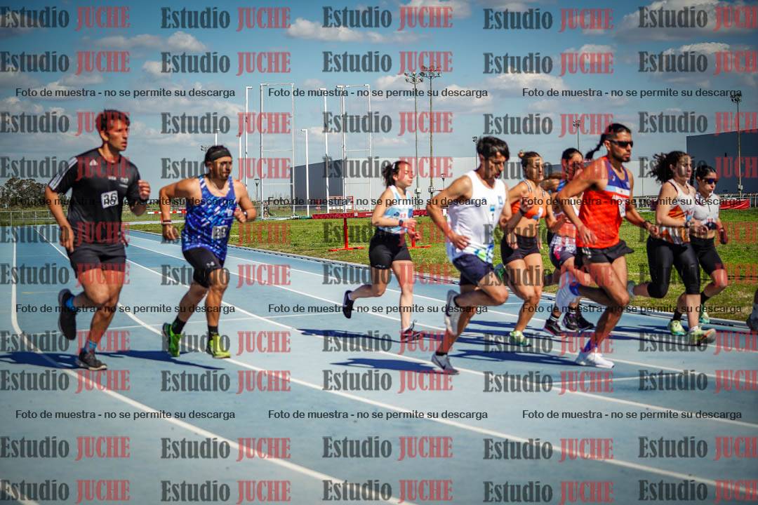 Fotos de los 5000 m llanos de mujeres y varones