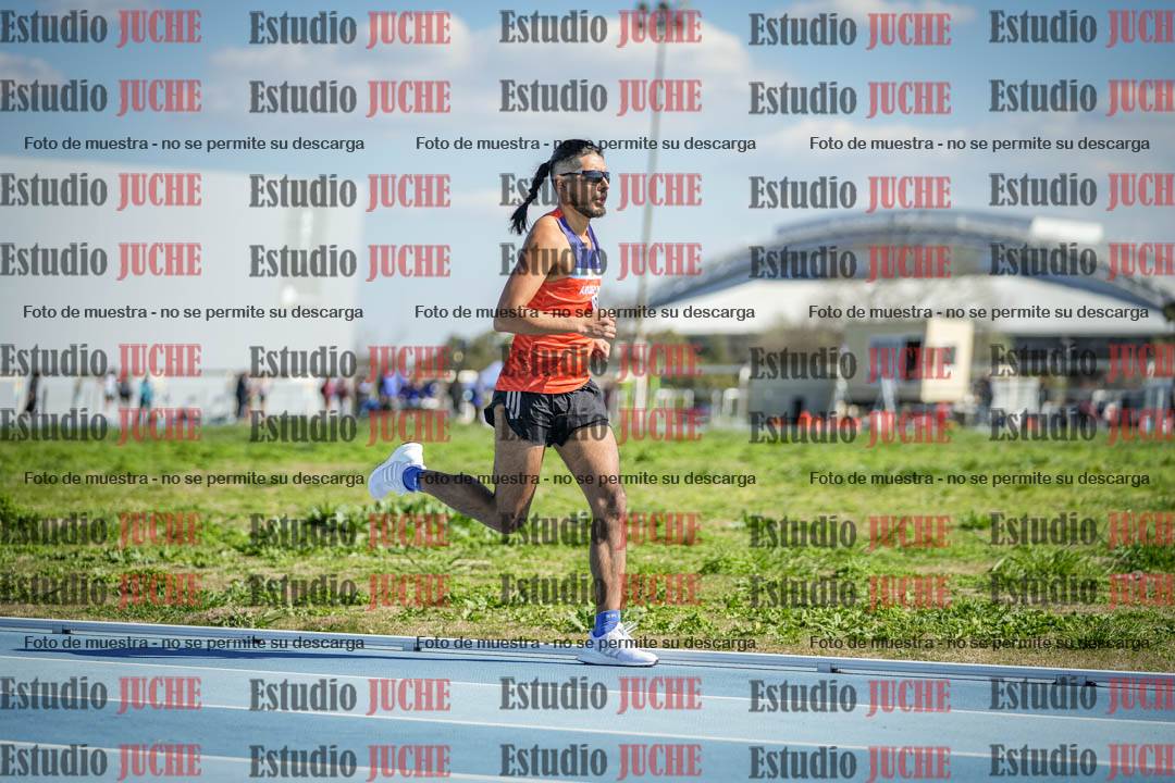 Fotos de los 5000 m llanos de mujeres y varones