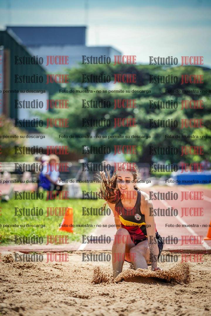 Fotos del salto en largo de mujeres
