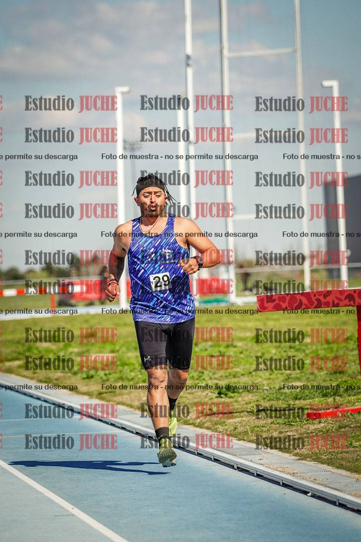 Fotos de los 5000 m llanos de mujeres y varones