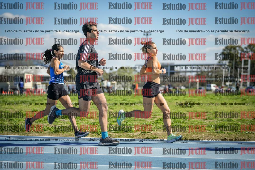 Fotos de los 5000 m llanos de mujeres y varones