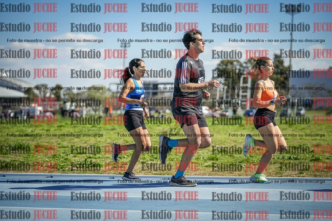 Fotos de los 5000 m llanos de mujeres y varones