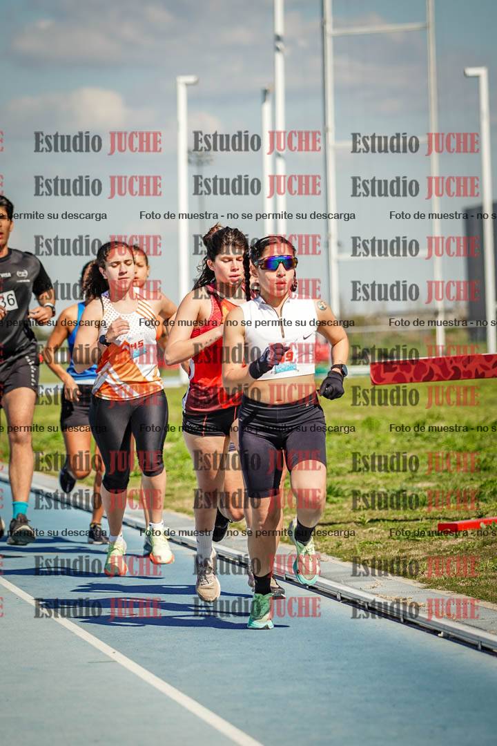 Fotos de los 5000 m llanos de mujeres y varones