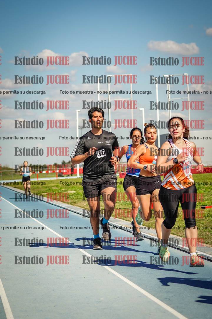 Fotos de los 5000 m llanos de mujeres y varones