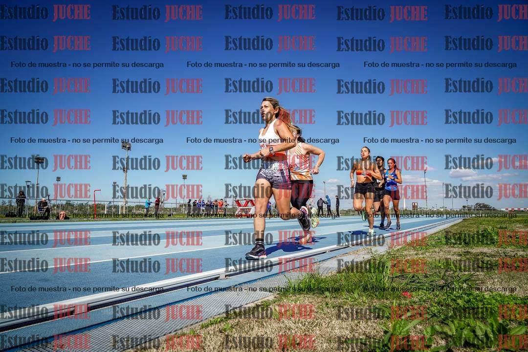 Fotos de los 5000 m llanos de mujeres y varones