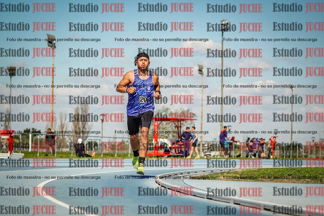 Fotos de los 5000 m llanos de mujeres y varones