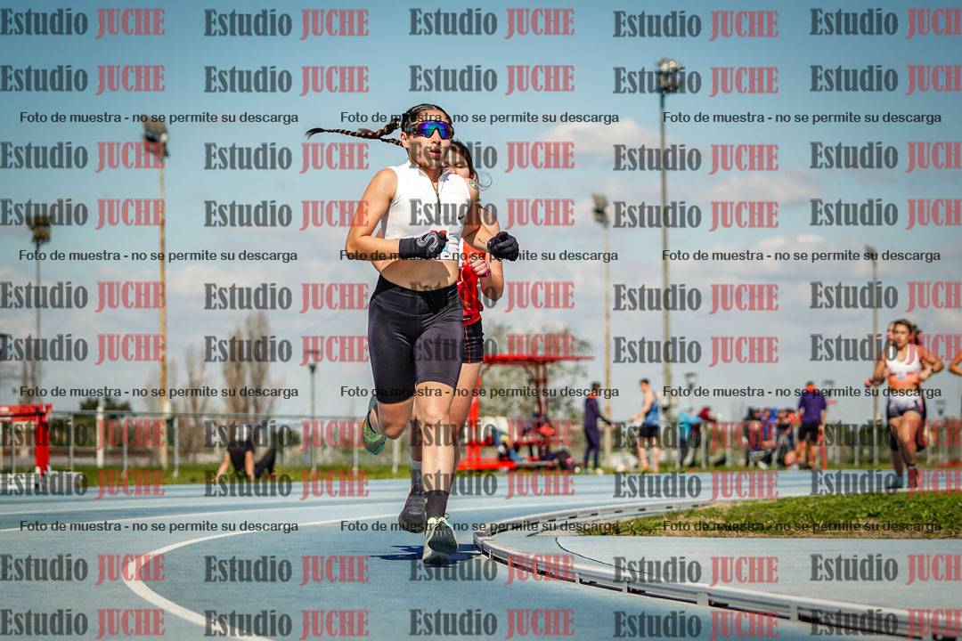 Fotos de los 5000 m llanos de mujeres y varones