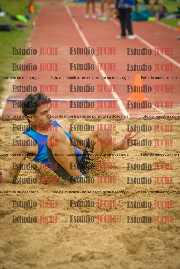Fotos del salto en largo de varones - mayores