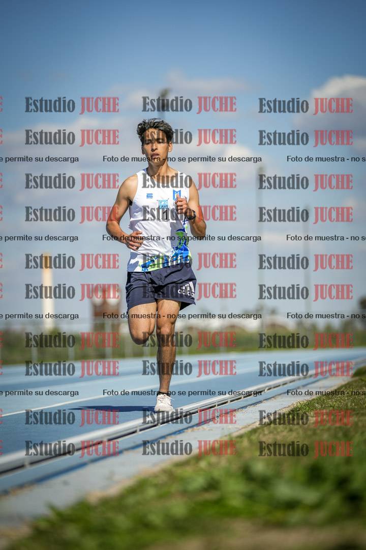 Fotos de los 5000 m llanos de mujeres y varones