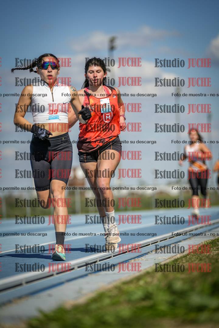 Fotos de los 5000 m llanos de mujeres y varones