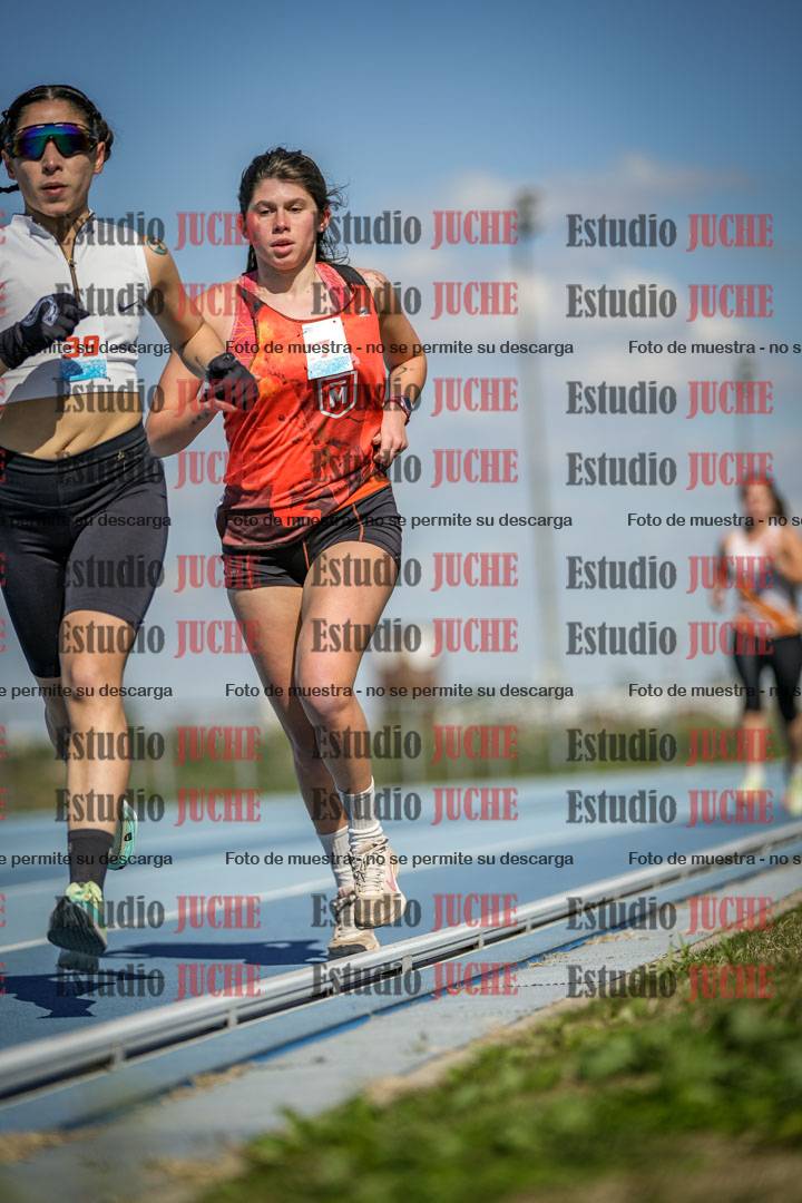 Fotos de los 5000 m llanos de mujeres y varones
