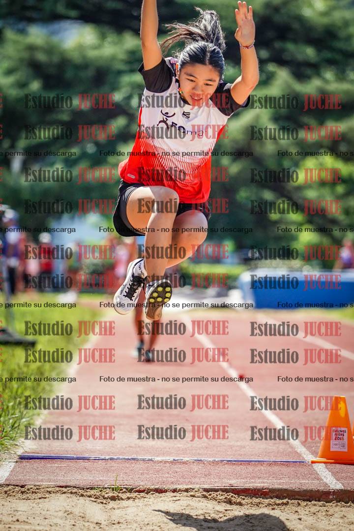 Fotos del salto en largo de mujeres