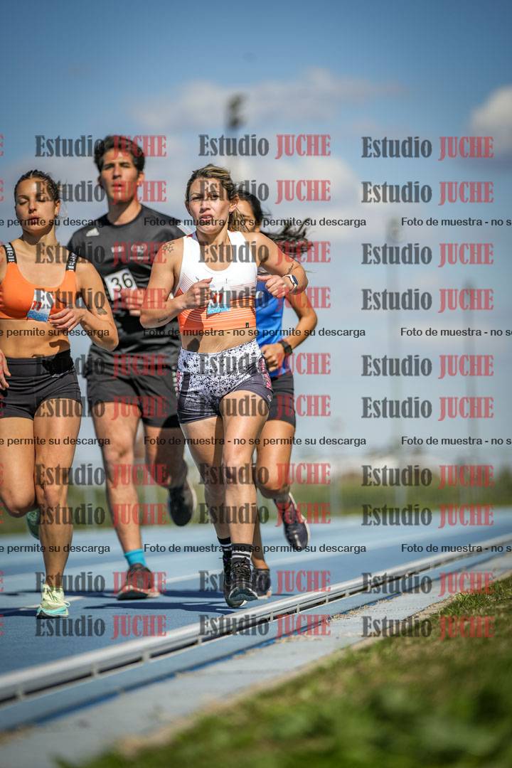 Fotos de los 5000 m llanos de mujeres y varones