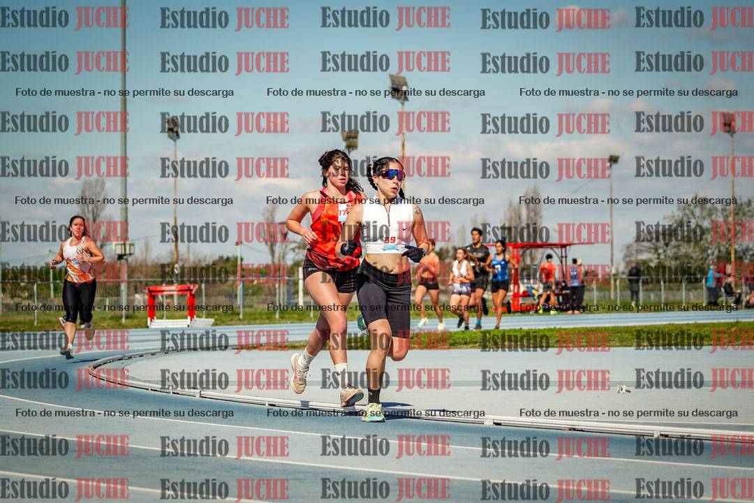 Fotos de los 5000 m llanos de mujeres y varones