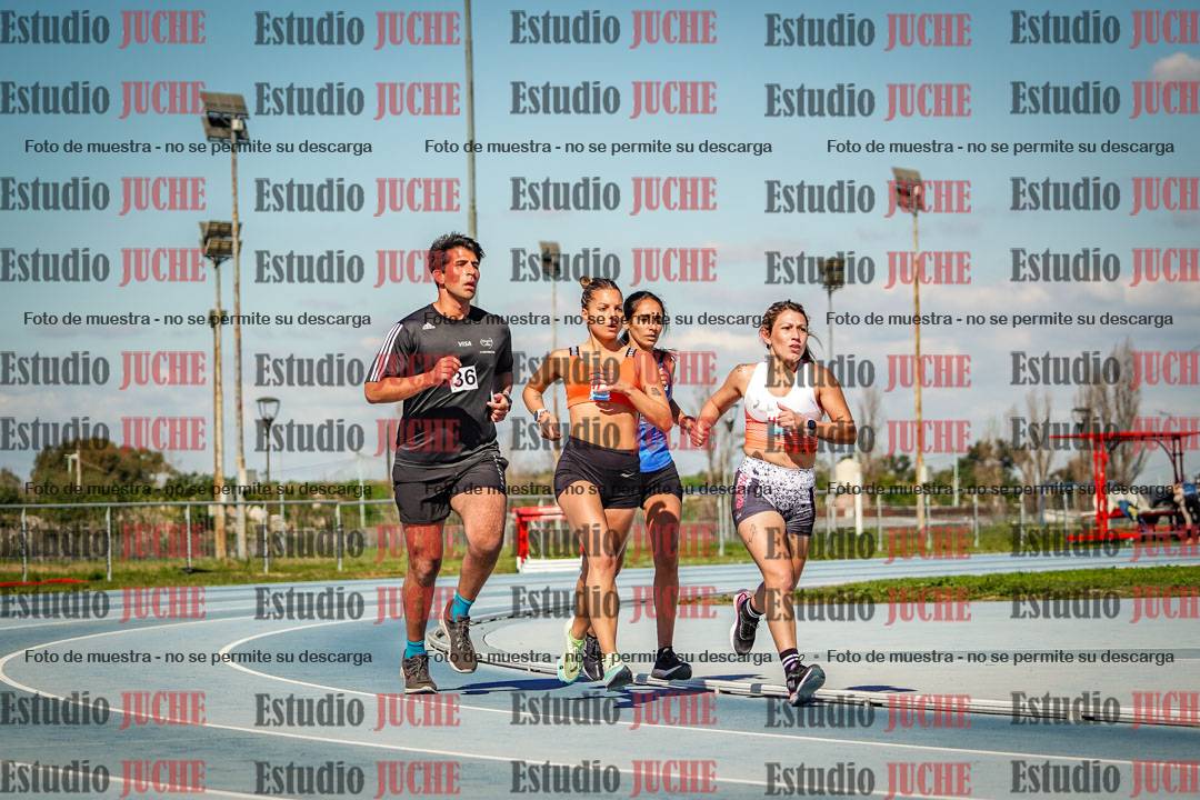 Fotos de los 5000 m llanos de mujeres y varones