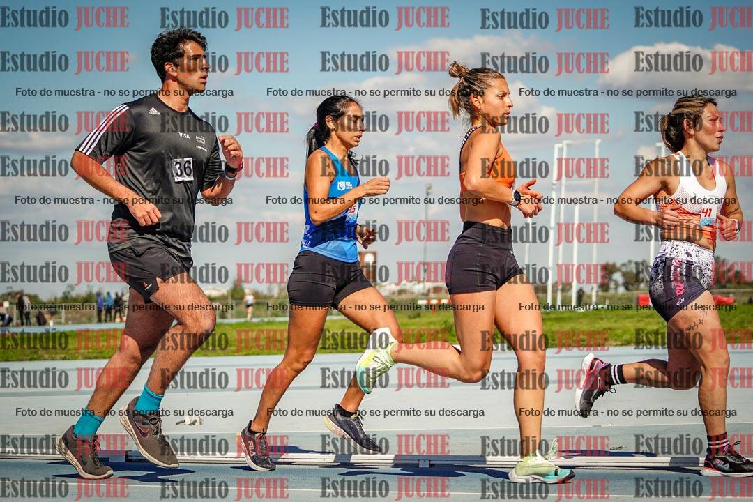Fotos de los 5000 m llanos de mujeres y varones