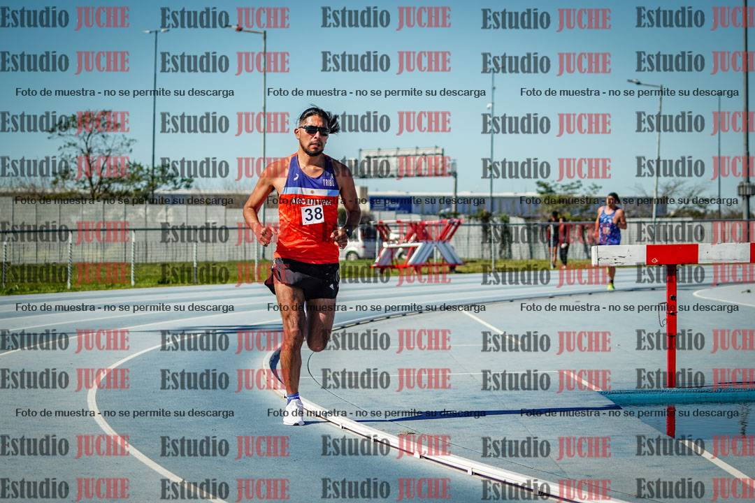 Fotos de los 5000 m llanos de mujeres y varones
