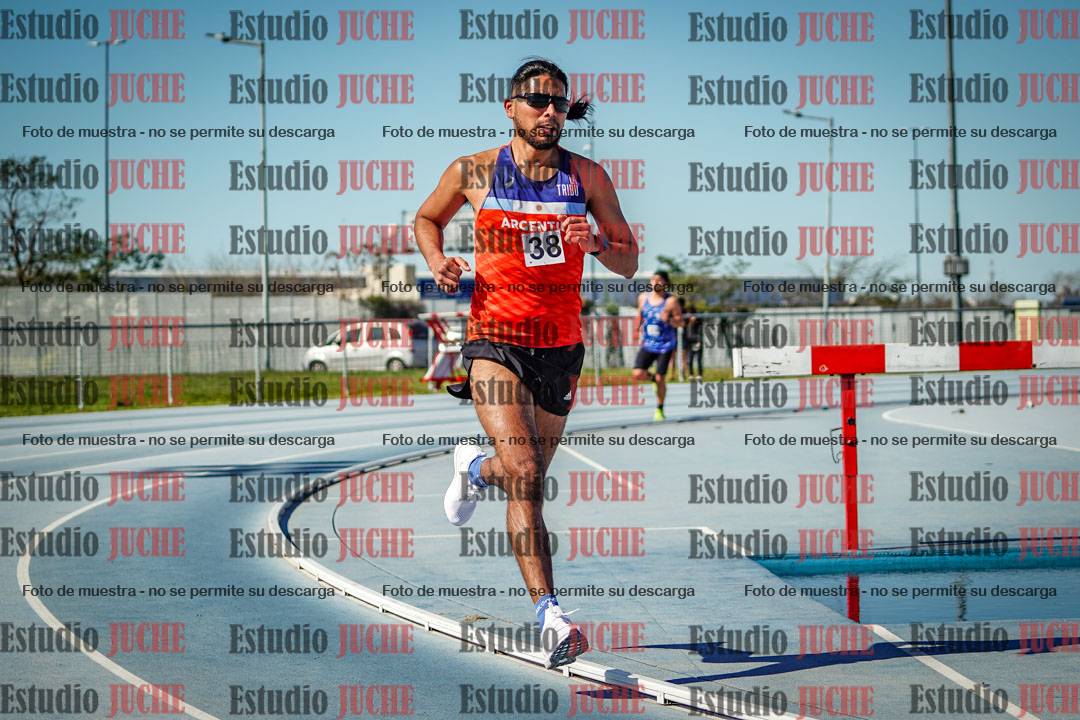 Fotos de los 5000 m llanos de mujeres y varones