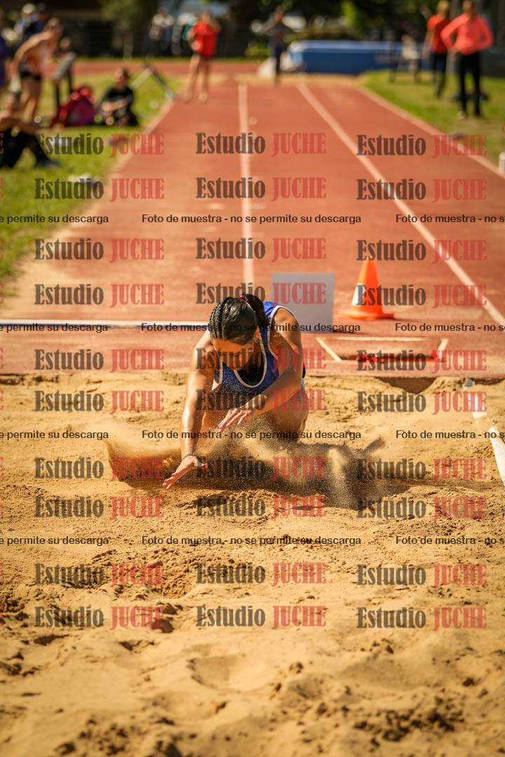 Fotos del salto en largo de mujeres
