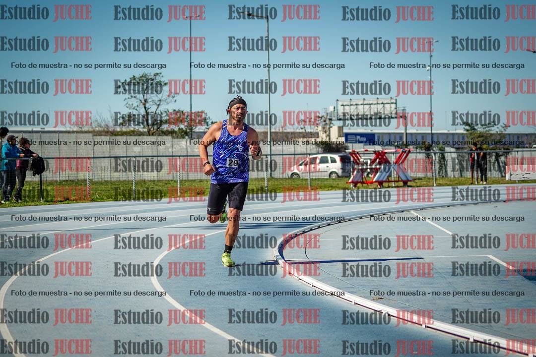 Fotos de los 5000 m llanos de mujeres y varones