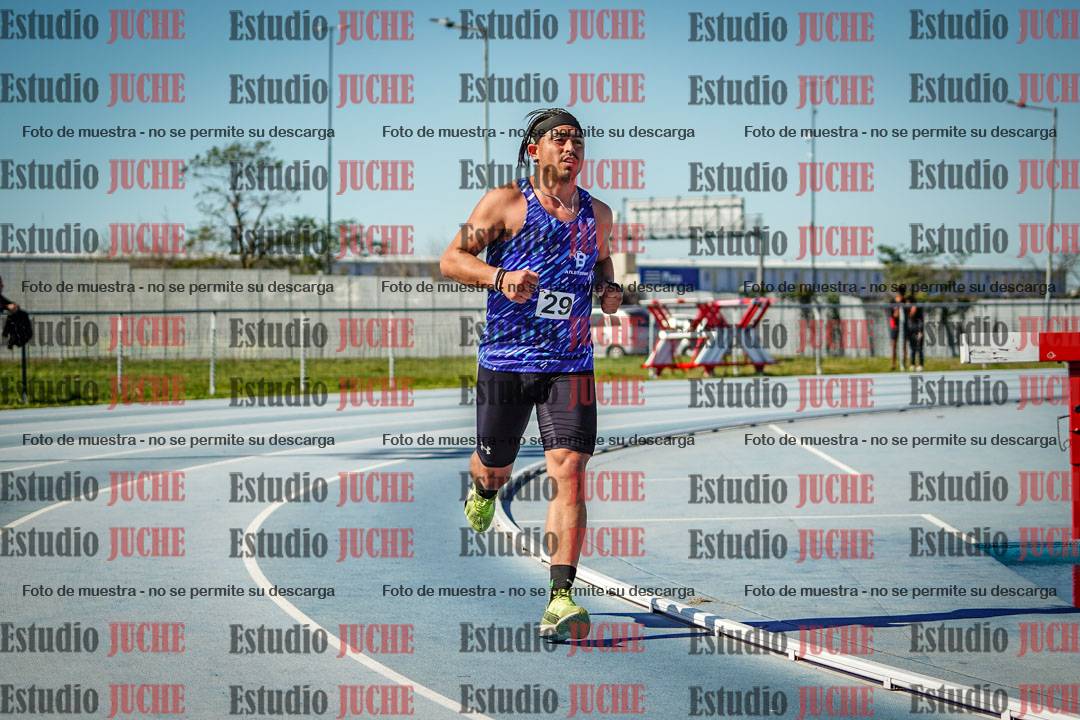 Fotos de los 5000 m llanos de mujeres y varones
