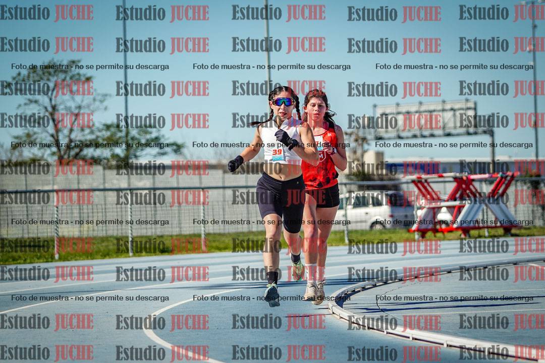 Fotos de los 5000 m llanos de mujeres y varones