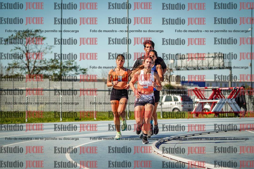 Fotos de los 5000 m llanos de mujeres y varones