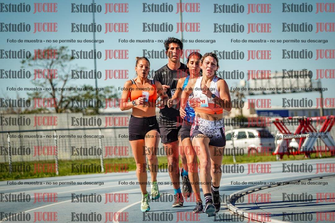 Fotos de los 5000 m llanos de mujeres y varones
