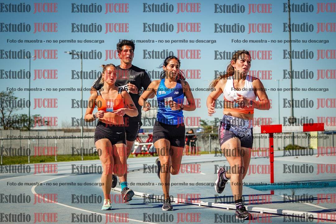 Fotos de los 5000 m llanos de mujeres y varones