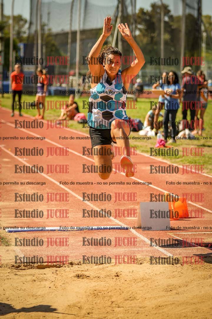 Fotos del salto en largo de mujeres