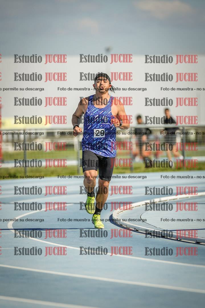 Fotos de los 5000 m llanos de mujeres y varones