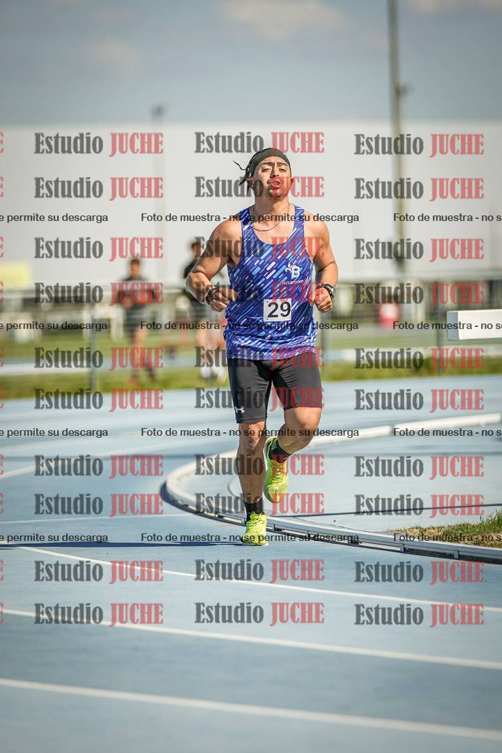 Fotos de los 5000 m llanos de mujeres y varones