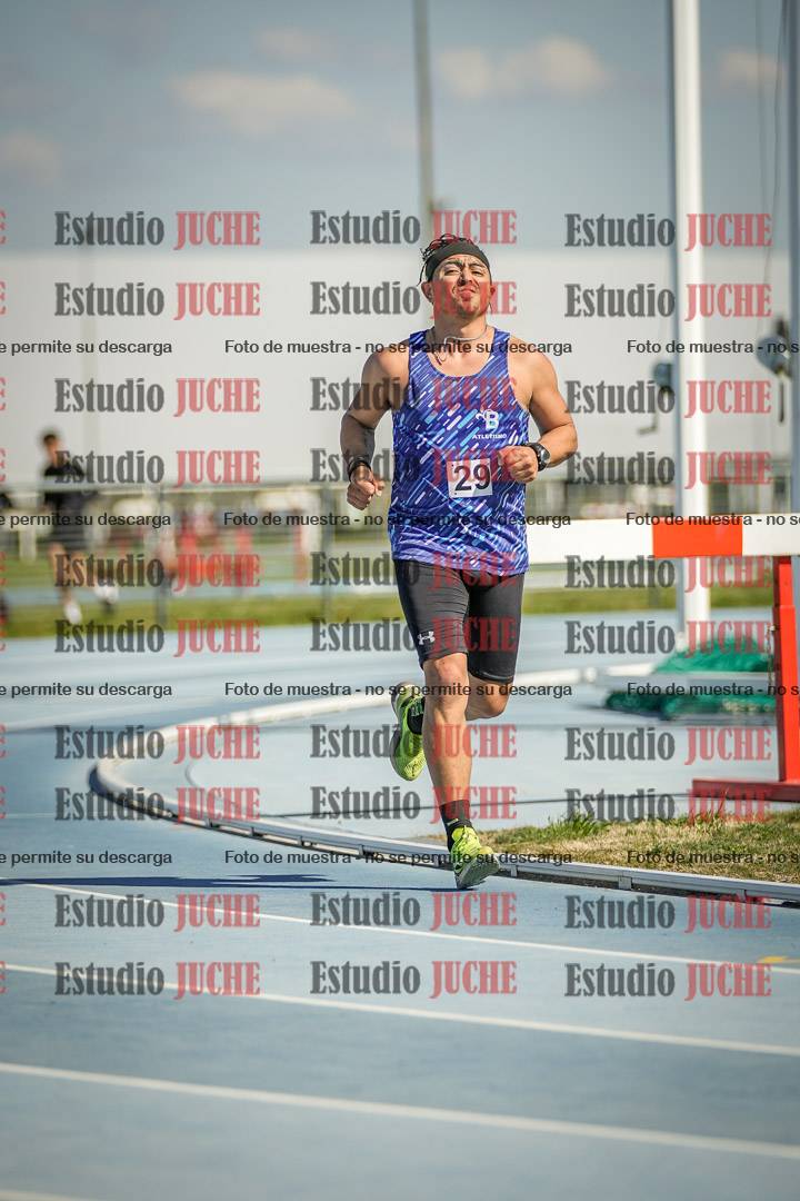 Fotos de los 5000 m llanos de mujeres y varones