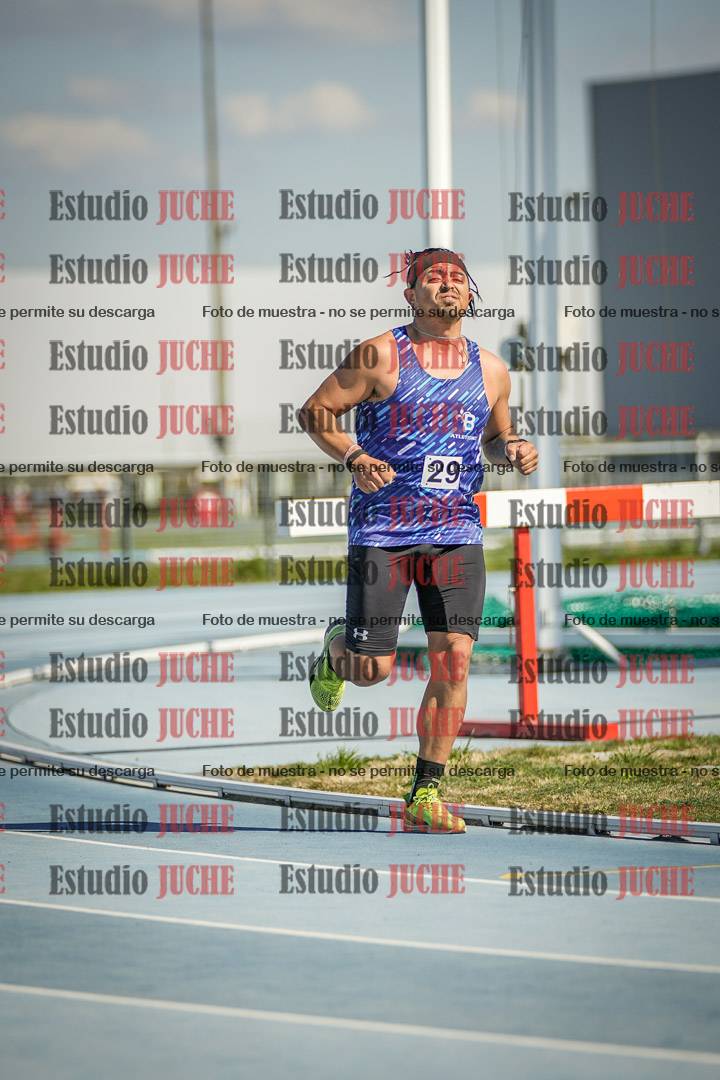 Fotos de los 5000 m llanos de mujeres y varones