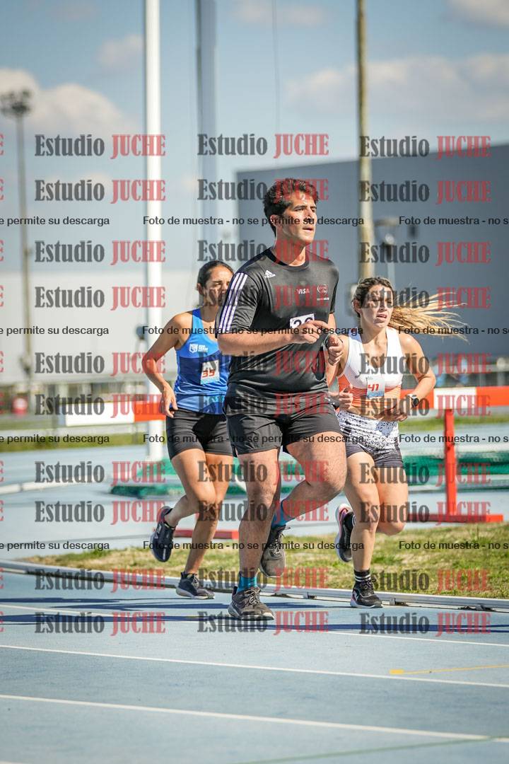 Fotos de los 5000 m llanos de mujeres y varones