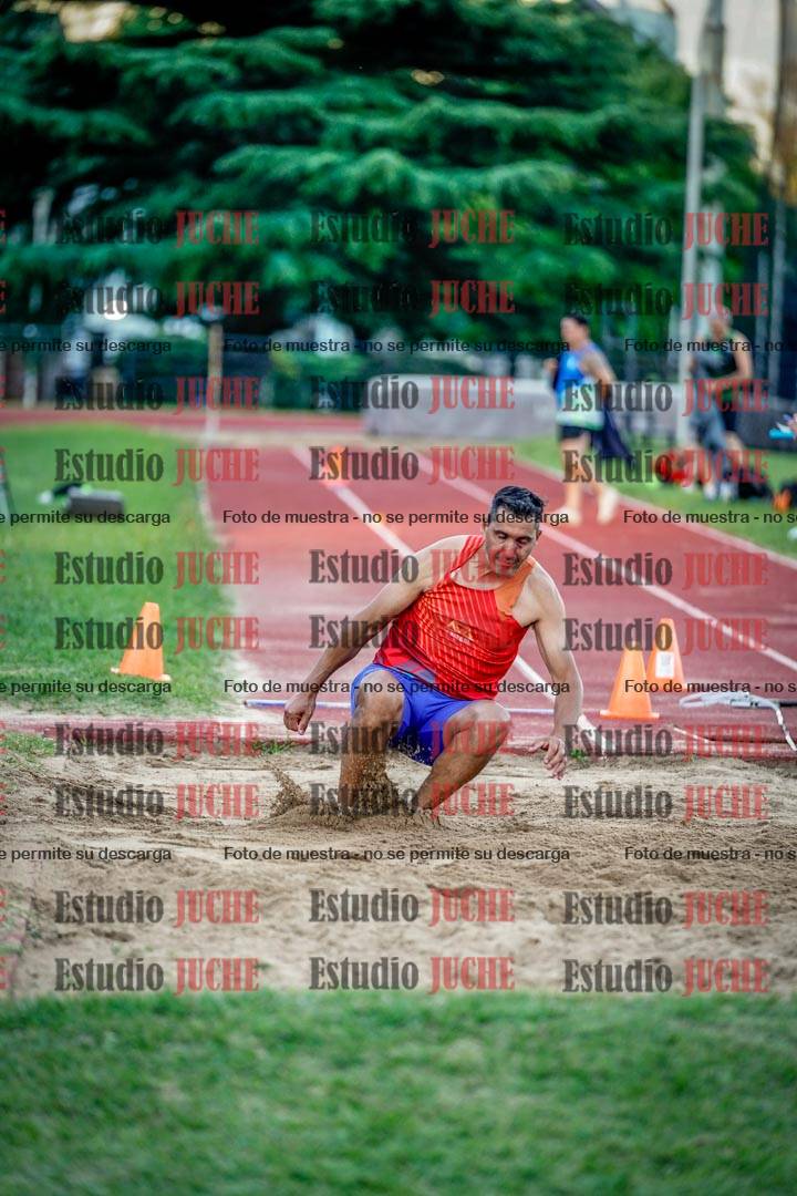 Fotos del salto en largo de varones