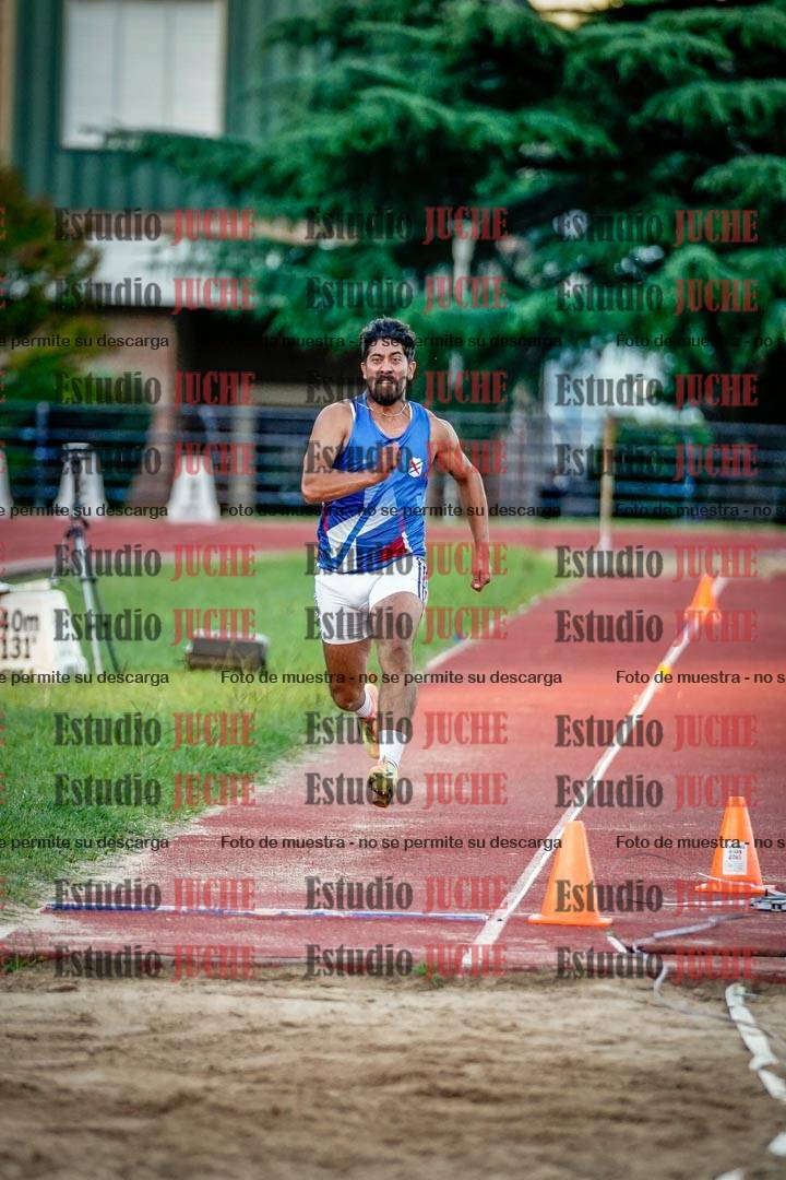 Fotos del salto en largo de varones