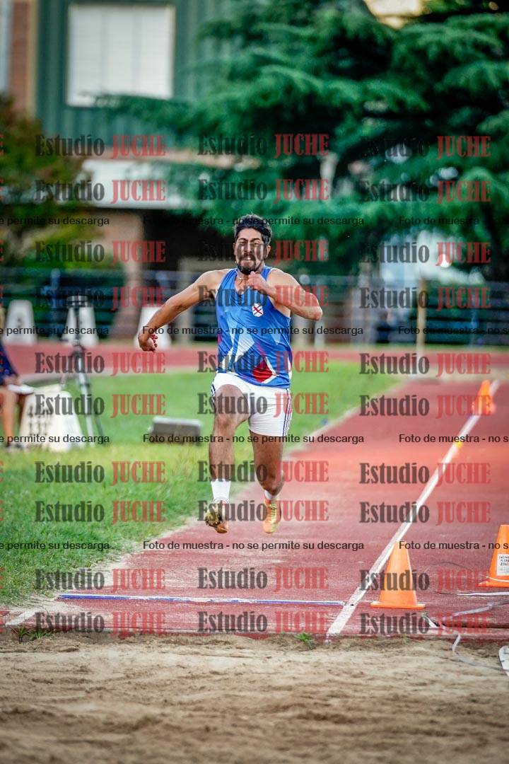 Fotos del salto en largo de varones