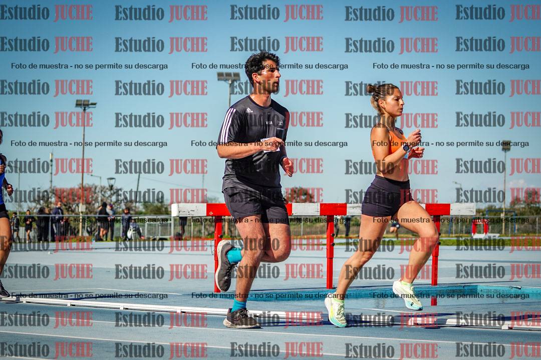 Fotos de los 5000 m llanos de mujeres y varones