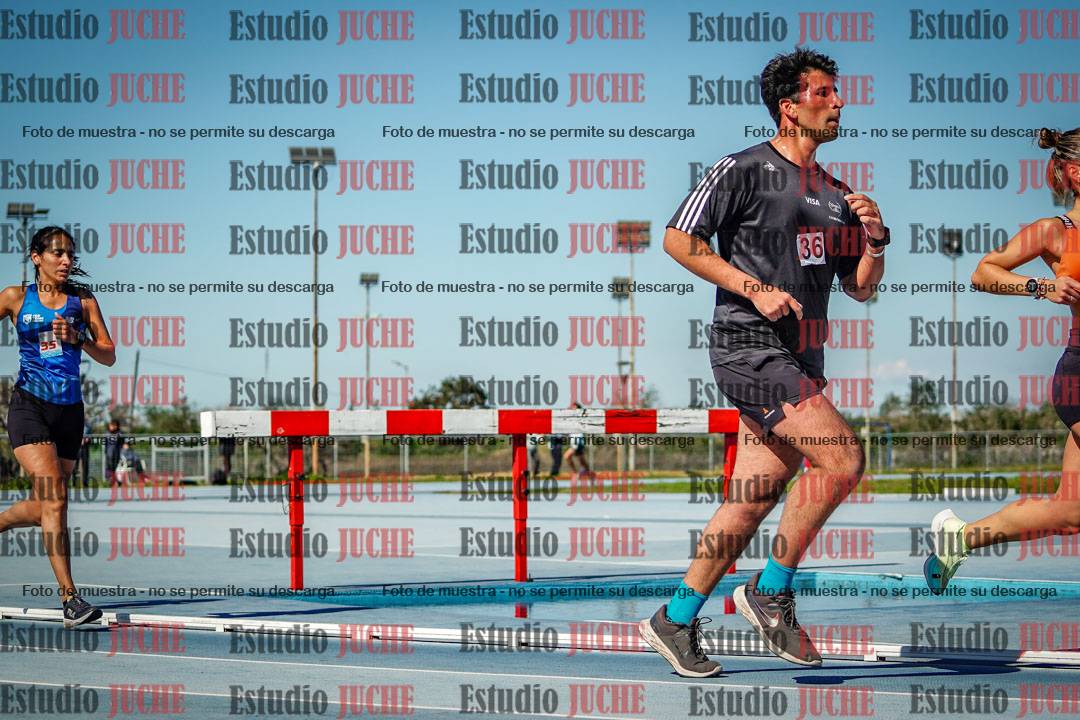 Fotos de los 5000 m llanos de mujeres y varones