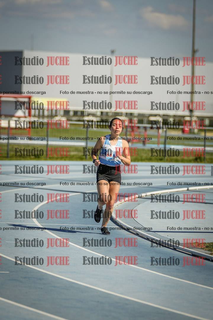 Fotos de los 5000 m llanos de mujeres y varones