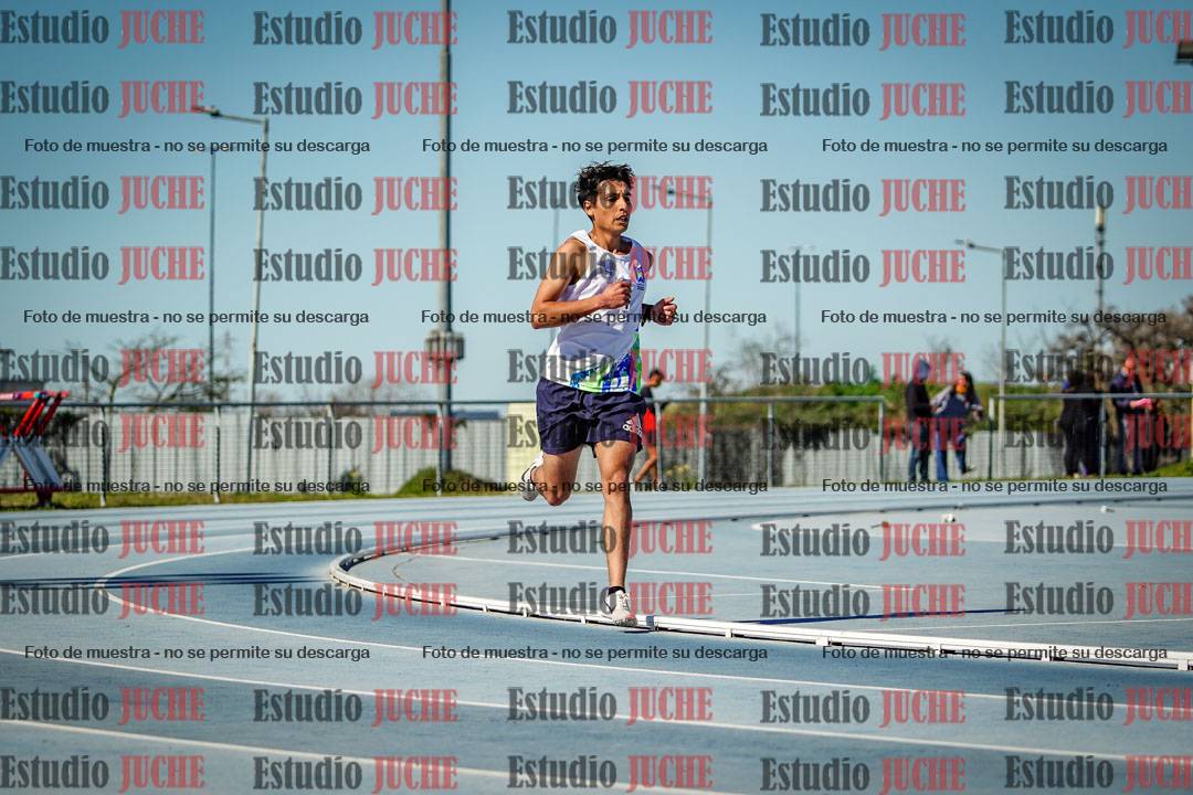 Fotos de los 5000 m llanos de mujeres y varones